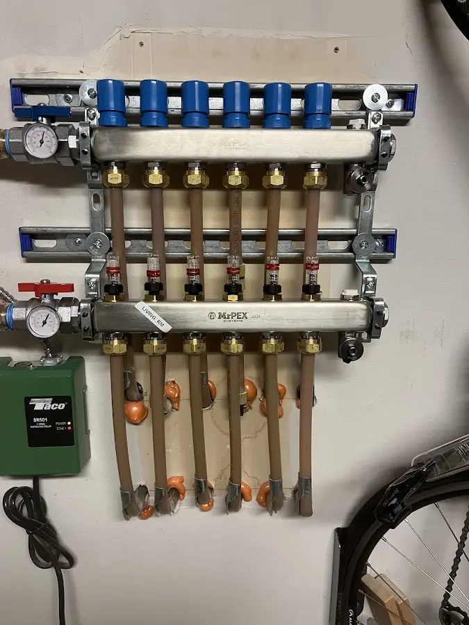 Plumber performing Water Heater Repair at a residential property in Somerville